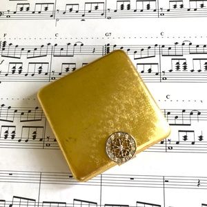Vintage gold Avon mirror compact